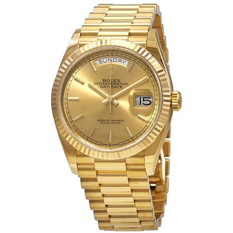 gold day date Rolex 36